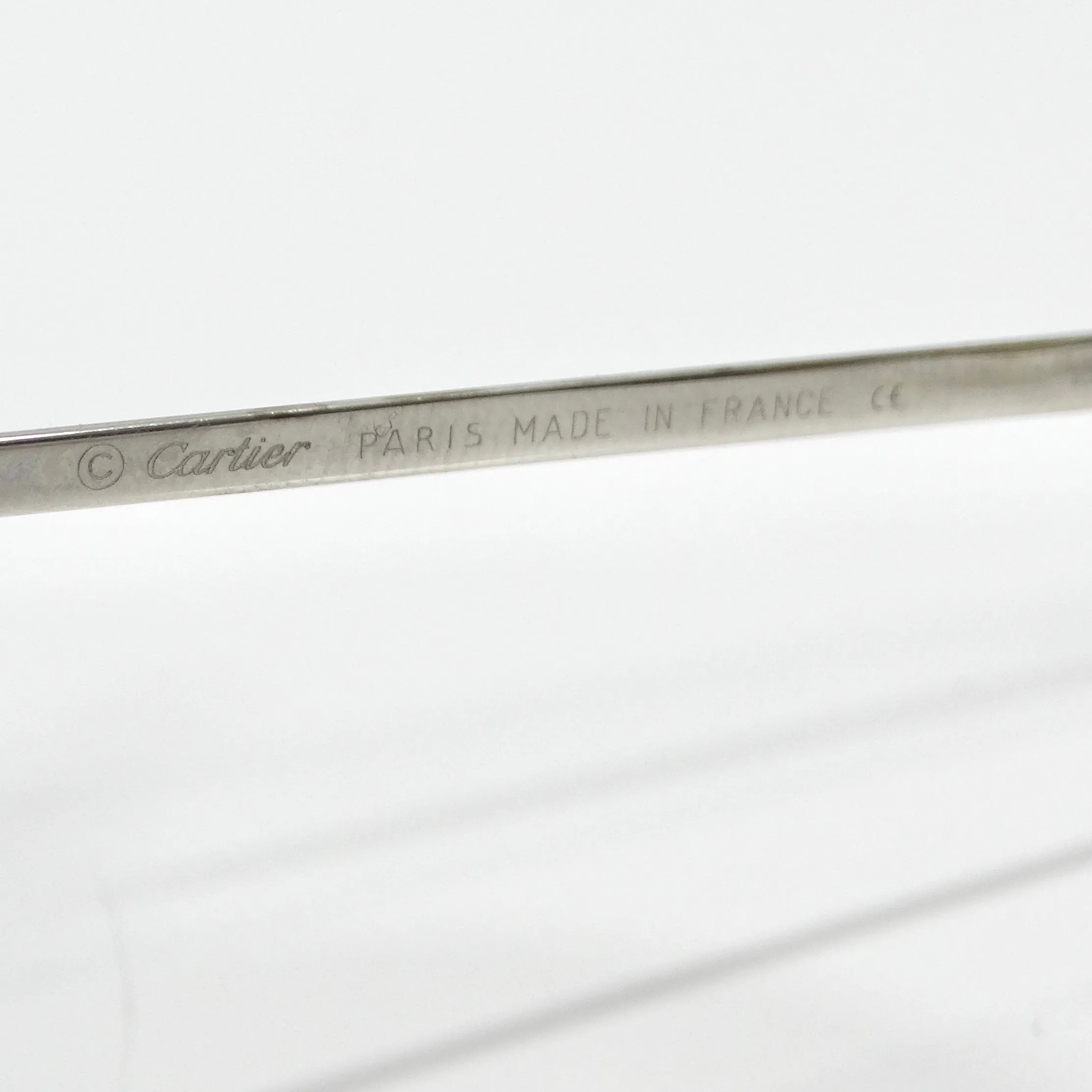 Cartier 1990s Silver Tone Rimless Sunglasses