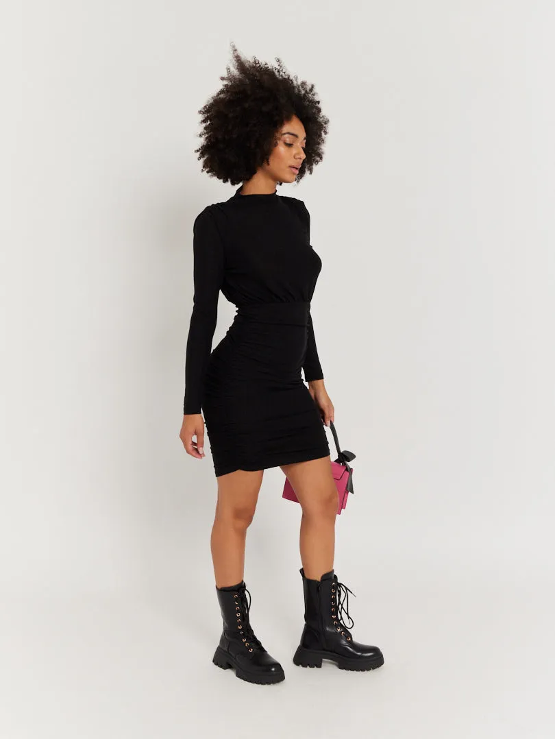 Robe noire pailletée manches longues