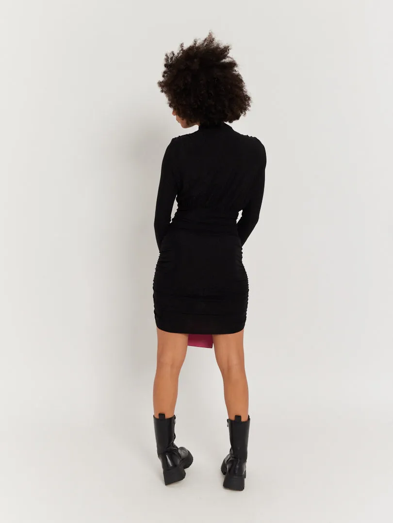 Robe noire pailletée manches longues